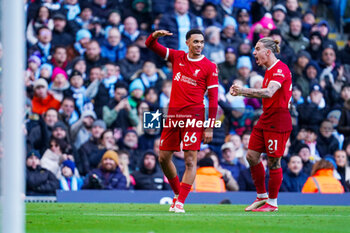 2023-11-25 - Liverpool defender Trent Alexander-Arnold (66) scores a goal and celebrates to make the score 1-1, Kostas Tsimikas during the English championship Premier League football match between Manchester City and Liverpool on 25 November 2023 at the Etihad Stadium in Manchester, England - FOOTBALL - ENGLISH CHAMP - MANCHESTER CITY V LIVERPOOL - ENGLISH PREMIER LEAGUE - SOCCER