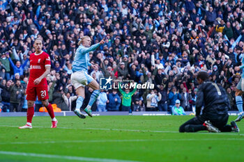 2023-11-25 - Manchester City forward Erling Haaland (9) scores a goal and celebrates to make the score 1-0 during the English championship Premier League football match between Manchester City and Liverpool on 25 November 2023 at the Etihad Stadium in Manchester, England - FOOTBALL - ENGLISH CHAMP - MANCHESTER CITY V LIVERPOOL - ENGLISH PREMIER LEAGUE - SOCCER