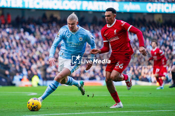 2023-11-25 - Manchester City forward Erling Haaland (9) wrestles with Liverpool defender Trent Alexander-Arnold (66) during the English championship Premier League football match between Manchester City and Liverpool on 25 November 2023 at the Etihad Stadium in Manchester, England - FOOTBALL - ENGLISH CHAMP - MANCHESTER CITY V LIVERPOOL - ENGLISH PREMIER LEAGUE - SOCCER