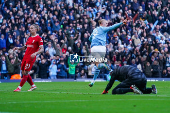 2023-11-25 - Manchester City forward Erling Haaland (9) scores a goal and celebrates to make the score 1-0 during the English championship Premier League football match between Manchester City and Liverpool on 25 November 2023 at the Etihad Stadium in Manchester, England - FOOTBALL - ENGLISH CHAMP - MANCHESTER CITY V LIVERPOOL - ENGLISH PREMIER LEAGUE - SOCCER