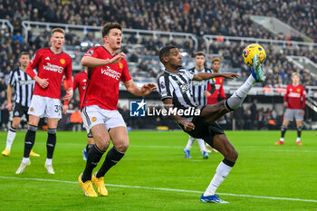 2023-12-02 - Alexander Isak of Newcastle and Harry Maguire of Manchester United during the English championship Premier League football match between Newcastle United and Manchester United on 2 December 2023 at St James’ Park in Newcastle, England - FOOTBALL - ENGLISH CHAMP - NEWCASTLE V MANCHESTER UNITED - ENGLISH PREMIER LEAGUE - SOCCER