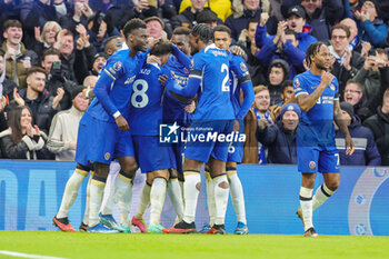 2023-12-03 - Chelsea midfielder Enzo Fernandez (8) celebrates with teammates after scoring a goal from a penalty kick 3-1 during the English championship Premier League football match between Chelsea and Brighton and Hove Albion on 3 December 2023 at Stamford Bridge in London, England - FOOTBALL - ENGLISH CHAMP - CHELSEA V BRIGHTON - ENGLISH PREMIER LEAGUE - SOCCER