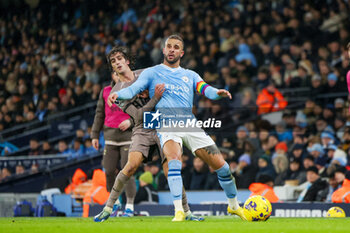 2023-12-03 - Manchester City defender Kyle Walker and Bryan Gil of Tottenham during the English championship Premier League football match between Manchester City and Tottenham Hotspur on 3 December 2023 at the Etihad Stadium in Manchester, England - FOOTBALL - ENGLISH CHAMP - MANCHESTER CITY V TOTTENHAM - ENGLISH PREMIER LEAGUE - SOCCER