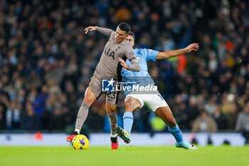 2023-12-03 - Tottenham Hotspur defender Pedro Porro (23) is fouled by Manchester City midfielder Rodri (16) during the English championship Premier League football match between Manchester City and Tottenham Hotspur on 3 December 2023 at the Etihad Stadium in Manchester, England - FOOTBALL - ENGLISH CHAMP - MANCHESTER CITY V TOTTENHAM - ENGLISH PREMIER LEAGUE - SOCCER