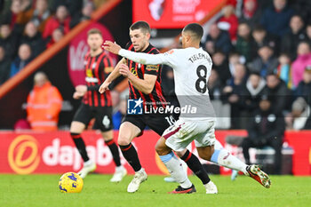 2023-12-03 - Ryan Christie (10) of AFC Bournemouth and Youri Tielemans (8) of Aston Villa during the English championship Premier League football match between Bournemouth and Aston Villa on 3 December 2023 at the Vitality Stadium in Bournemouth, England - FOOTBALL - ENGLISH CHAMP - BOURNEMOUTH V ASTON VILLA - ENGLISH PREMIER LEAGUE - SOCCER