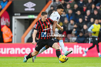 2023-12-03 - Ollie Watkins (11) of Aston Villa battles for possession with Illya Zabarnyi (27) of AFC Bournemouth during the English championship Premier League football match between Bournemouth and Aston Villa on 3 December 2023 at the Vitality Stadium in Bournemouth, England - FOOTBALL - ENGLISH CHAMP - BOURNEMOUTH V ASTON VILLA - ENGLISH PREMIER LEAGUE - SOCCER
