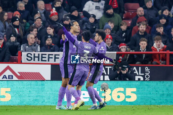 2023-12-06 - Liverpool defender Virgil van Dijk (4) scores a goal and celebrates to make the score 0-1 during the English championship Premier League football match between Sheffield United and Liverpool FC on 6 December 2023 at Bramall Lane in Sheffield, England - FOOTBALL - ENGLISH CHAMP - SHEFFIELD V LIVERPOOL - ENGLISH PREMIER LEAGUE - SOCCER