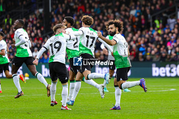 2023-12-09 - Mohamed Salah (11) of Liverpool scores a goal and celebrates 1-1 during the English championship Premier League football match between Crystal Palace and Liverpool on 9 December 2023 at Selhurst Park in London, England - FOOTBALL - ENGLISH CHAMP - CRYSTAL PALACE V LIVERPOOL - ENGLISH PREMIER LEAGUE - SOCCER