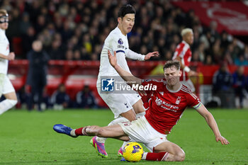 2023-12-15 - Ryan Yates of Nottingham Forest and Son Heung-Min of Tottenham Hotspur during the English championship Premier League football match between Nottingham Forest and Tottenham Hotspur on 15 December 2023 at the City Ground in Nottingham, England - FOOTBALL - ENGLISH CHAMP - NOTTINGHAM FOREST V TOTTENHAM - ENGLISH PREMIER LEAGUE - SOCCER