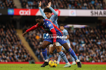 2023-12-16 - Jeffrey Schlupp of Crystal Palace and Rico Lewis of Manchester City during the English championship Premier League football match between Manchester City and Crystal Palace on 16 December 2023 at the Etihad Stadium in Manchester, England - FOOTBALL - ENGLISH CHAMP - MANCHESTER CITY V CRYSTAL PALACE - ENGLISH PREMIER LEAGUE - SOCCER