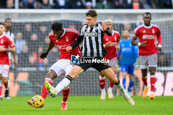 2023-12-26 - Ibrahim Sangare of Nottingham Forest and Lewis Miley of Newcastle during the English championship Premier League football match between Newcastle United and Nottingham Forest on 26 December 2023 at St. James' Park in Newcastle, England - FOOTBALL - ENGLISH CHAMP - NEWCASTLE V NOTTINGHAM FOREST - ENGLISH PREMIER LEAGUE - SOCCER