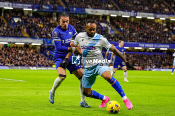 2023-12-27 - Jordan Ayew (9) of Crystal Palace battles with Malo Gusto (27) of Chelsea during the English championship Premier League football match between Chelsea and Crystal Palace on 27 December 2023 at Stamford Bridge in London, England - FOOTBALL - ENGLISH CHAMP - CHELSEA V CRYSTAL PALACE - ENGLISH PREMIER LEAGUE - SOCCER