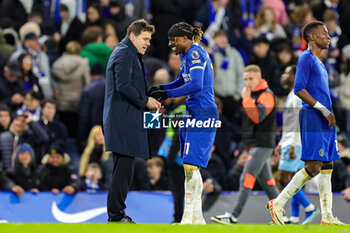 2023-12-27 - Mauricio Pochettino Manager of Chelsea congratulates Noni Madueke (11) of Chelsea at full time during the English championship Premier League football match between Chelsea and Crystal Palace on 27 December 2023 at Stamford Bridge in London, England - FOOTBALL - ENGLISH CHAMP - CHELSEA V CRYSTAL PALACE - ENGLISH PREMIER LEAGUE - SOCCER
