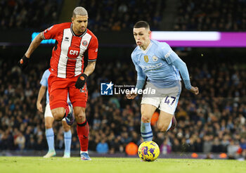 2023-12-30 - Manchester City midfielder Phil Foden (47) and Sheffield United Midfielder Vinicius Souza (21) during the English championship Premier League football match between Manchester City and Sheffield United on 30 December 2023 at the Etihad Stadium in Manchester, England - FOOTBALL - ENGLISH CHAMP - MANCHESTER CITY V SHEFFIELD UNITED - ENGLISH PREMIER LEAGUE - SOCCER