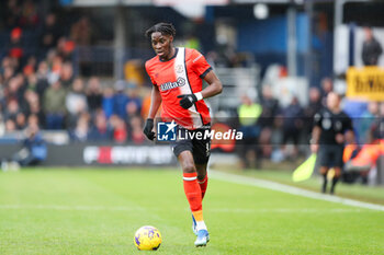 2023-12-30 - Luton Town Forward Elijah Adebayo during the English championship Premier League football match between Luton Town and Chelsea on 30 December 2023 at Kenilworth Road in Luton, England - FOOTBALL - ENGLISH CHAMP - LUTON TOWN V CHELSEA - ENGLISH PREMIER LEAGUE - SOCCER