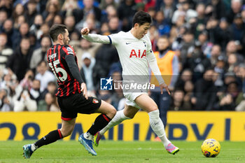 2023-12-31 - Tottenham Hotspur forward Son Heung-Min (7) and Bournemouth defender Adam Smith (15) during the English championship Premier League football match between Tottenham Hotspur and Bournemouth on 31 December 2023 at Tottenham Hotspur Stadium in London, England - FOOTBALL - ENGLISH CHAMP - TOTTENHAM V BOURNEMOUTH - ENGLISH PREMIER LEAGUE - SOCCER