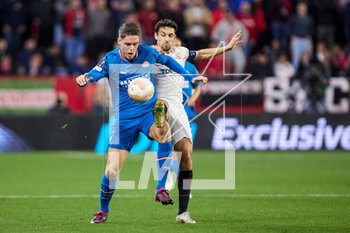 2023-02-16 - Guus Til of PSV Eindhoven and Jesus Navas of Sevilla FC during the UEFA Europa League, Play-off, 1st leg football match between Sevilla FC and PSV Eindhoven on February 16, 2023 at Estadio Ramon Sanchez Pizjuan in Sevilla, Spain - FOOTBALL - EUROPA LEAGUE - SEVILLA FC V PSV EINDHOVEN - UEFA EUROPA LEAGUE - SOCCER