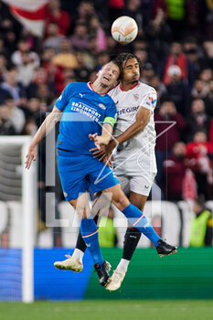 2023-02-16 - Loic Bade of Sevilla FC and Luuk de Jong of PSV Eindhoven during the UEFA Europa League, Play-off, 1st leg football match between Sevilla FC and PSV Eindhoven on February 16, 2023 at Estadio Ramon Sanchez Pizjuan in Sevilla, Spain - FOOTBALL - EUROPA LEAGUE - SEVILLA FC V PSV EINDHOVEN - UEFA EUROPA LEAGUE - SOCCER