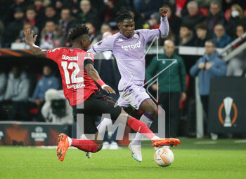 2023-02-16 - Breel Embolo of AS Monaco and Edmond Tapsoba of Bayer Leverkusen during the UEFA Europa League, Play-off, 1st leg football match between Bayer Leverkusen and AS Monaco on February 16, 2023 at BayArena in Leverkusen, Germany - FOOTBALL - EUROPA LEAGUE - LEVERKUSEN V MONACO - UEFA EUROPA LEAGUE - SOCCER