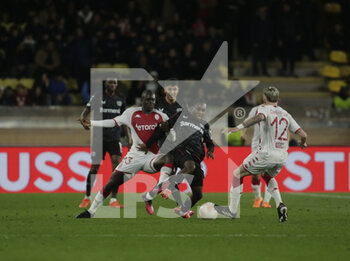 2023-02-23 - Jeremie Frimpong of Bayer 04 Leverkusen and Malang Sarr of As Monaco during the Uefa Europa League, football match between As Monaco and Bayer 04 Leverkusen,on 23 February 2023 at State Luis II in Monaco, Photo Ndrerim Kaceli - AS MONACO VS BAYER LEVERKUSEN - UEFA EUROPA LEAGUE - SOCCER