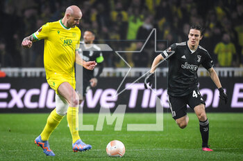 2023-02-23 - Nicolas PALLOIS of Nantes and Nicolo FAGIOLI of Juventus during the UEFA Europa League, Play-off, 2nd leg football match between FC Nantes and Juventus FC on February 23, 2023 at La Beaujoire stadium in Nantes, France - FOOTBALL - EUROPA LEAGUE - NANTES V JUVENTUS - UEFA EUROPA LEAGUE - SOCCER