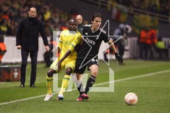 2023-02-23 - Nicolo Fagioli of Juventus, Moses Simon of Nantes (left) during the UEFA Europa League, Play-off, 2nd leg football match between FC Nantes and Juventus Turin on February 23, 2023 at La Beaujoire stadium in Nantes, France - FOOTBALL - EUROPA LEAGUE - NANTES V JUVENTUS - UEFA EUROPA LEAGUE - SOCCER