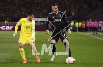 2023-02-23 - Filip Kostic of Juventus, Fabien Centonze of Nantes (left) during the UEFA Europa League, Play-off, 2nd leg football match between FC Nantes and Juventus Turin on February 23, 2023 at La Beaujoire stadium in Nantes, France - FOOTBALL - EUROPA LEAGUE - NANTES V JUVENTUS - UEFA EUROPA LEAGUE - SOCCER