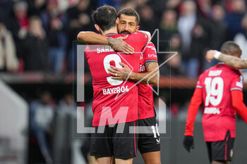 2023-03-09 - Kerem Demirbay of Bayer 04 Leverkusen celebrate the first goal with Sardar Azmoun during the UEFA Europa League, Round of 16, 1st leg football match between Bayer 04 Leverkusen and Ferencvaros TC on March 9, 2023 at the BayArena in Leverkusen, Germany - FOOTBALL - EUROPA LEAGUE - LEVERKUSEN V FERENCVAROS - UEFA EUROPA LEAGUE - SOCCER