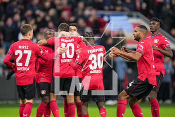 2023-03-09 - Kerem Demirbay of Bayer 04 Leverkusen celebrate the first goal with teammates during the UEFA Europa League, Round of 16, 1st leg football match between Bayer 04 Leverkusen and Ferencvaros TC on March 9, 2023 at the BayArena in Leverkusen, Germany - FOOTBALL - EUROPA LEAGUE - LEVERKUSEN V FERENCVAROS - UEFA EUROPA LEAGUE - SOCCER
