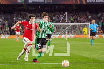 2023-03-17 - Facundo Pellistri (28) of Manchester United and Juan Miranda (33) of Real Betis during the UEFA Europa League, Round of 16, 2nd leg football match between Real Betis and Manchester United on 16 March 2023 at Estadio Benito Villamarin in Seville, Spain - FOOTBALL - EUROPA LEAGUE - REAL BETIS V MANCHESTER UNITED - UEFA EUROPA LEAGUE - SOCCER