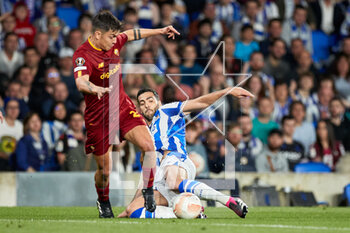 2023-03-16 - Paulo Dybala of AS Roma competes for the ball with Mikel Merino of Real Sociedad during the UEFA Europa League, Round of 16, 2nd leg football match between Real Sociedad and AS Roma on March 16, 2023 at Reale Arena in San Sebastian, Spain - FOOTBALL - EUROPA LEAGUE - REAL SOCIEDAD V AS ROMA - UEFA EUROPA LEAGUE - SOCCER