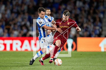 2023-03-16 - Martin Zubimendi of Real Sociedad and Andrea Belotti of AS Roma during the UEFA Europa League, Round of 16, 2nd leg football match between Real Sociedad and AS Roma on March 16, 2023 at Reale Arena in San Sebastian, Spain - FOOTBALL - EUROPA LEAGUE - REAL SOCIEDAD V AS ROMA - UEFA EUROPA LEAGUE - SOCCER