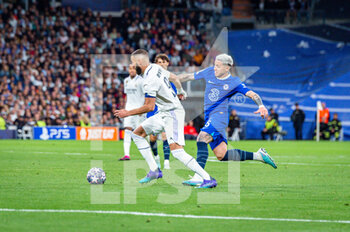 2023-04-12 - Karim Benzema (Real Madrid) and Enzo Fernández (Chelsea) in action during the football match between
Real Madrid and Chelsea valid for the first leg of the quarter final of the Uefa Champion’s League celebrated in Madrid, Spain at Bernabeu stadium on Tuesday 12 March 2023 - QUARTER FINALS - REAL MADRID FC VS CHELSEA FC - UEFA CHAMPIONS LEAGUE - SOCCER