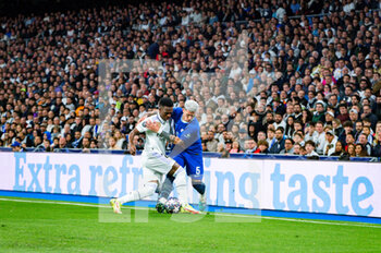 2023-04-12 - Enzo Fernández (Chelsea) and Vinícius Júnior (Real Madrid) in action during the football match between
Real Madrid and Chelsea valid for the first leg of the quarter final of the Uefa Champion’s League celebrated in Madrid, Spain at Bernabeu stadium on Tuesday 12 March 2023 - QUARTER FINALS - REAL MADRID FC VS CHELSEA FC - UEFA CHAMPIONS LEAGUE - SOCCER