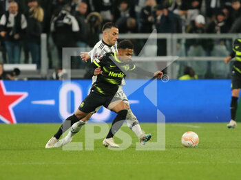 2023-04-13 - Paulinho of Sporting CP and Filip Kostic of Juventus during the Uefa Europa League, football match between Juventus Fc and Sporting Cp on 13 April 2023 at Allianz Stadium, Turin, Italy. Photo Nderim Kaceli - QUARTER-FINALS - JUVENTUS FC VS SPORTING SP - UEFA EUROPA LEAGUE - SOCCER
