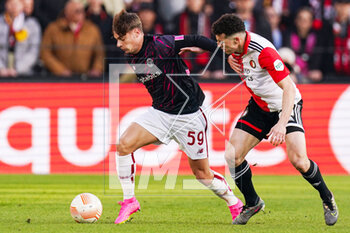2023-04-13 - Nicola Zalewski of AS Roma, Oussama Idrissi of Feyenoord during the UEFA Europa League, Quarter-finals, 1st leg football match between Feyenoord and AS Roma on April 13, 2023 at Stadion Feijenoord 'De Kuip' in Rotterdam, Netherlands - FOOTBALL - EUROPA LEAGUE - FEYENOORD V ROMA - UEFA EUROPA LEAGUE - SOCCER