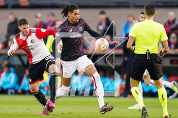 2023-04-13 - Santiago Gimenez of Feyenoord, Chris Smalling of AS Roma during the UEFA Europa League, Quarter-finals, 1st leg football match between Feyenoord and AS Roma on April 13, 2023 at Stadion Feijenoord 'De Kuip' in Rotterdam, Netherlands - FOOTBALL - EUROPA LEAGUE - FEYENOORD V ROMA - UEFA EUROPA LEAGUE - SOCCER