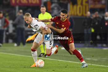 2023-05-11 - Mitchel Bakker of Bayer 04 Leverkusen and Mehmet Celik of A.S. Roma during the first leg of the Semi-final of the UEFA Europa League between A.S. Roma vs Bayer 04 Leverkusen on May 11, 2023 at the Stadio Olimpico in Rome. - SEMIFINAL - AS ROMA VS BAYER 04 LEVERKUSEN - UEFA EUROPA LEAGUE - SOCCER