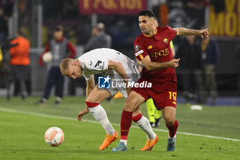 2023-05-11 - Mitchel Bakker of Bayer 04 Leverkusen and Mehmet Celik of A.S. Roma during the first leg of the Semi-final of the UEFA Europa League between A.S. Roma vs Bayer 04 Leverkusen on May 11, 2023 at the Stadio Olimpico in Rome. - SEMIFINAL - AS ROMA VS BAYER 04 LEVERKUSEN - UEFA EUROPA LEAGUE - SOCCER