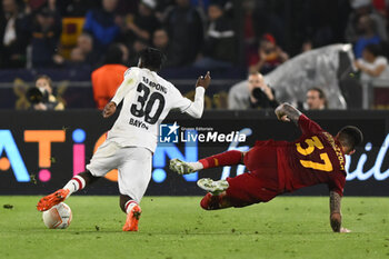 2023-05-11 - Jeremie Frimpong of Bayer 04 Leverkusenv and Leonardo Spinazzola of A.S. Roma during the first leg of the Semi-final of the UEFA Europa League between A.S. Roma vs Bayer 04 Leverkusen on May 11, 2023 at the Stadio Olimpico in Rome. - SEMIFINAL - AS ROMA VS BAYER 04 LEVERKUSEN - UEFA EUROPA LEAGUE - SOCCER