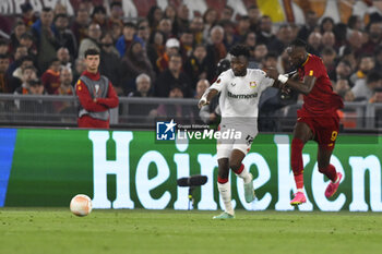 2023-05-11 - Edmond Tapsoba of Bayer 04 Leverkusen and Tammy Abraham of A.S. Roma during the first leg of the Semi-final of the UEFA Europa League between A.S. Roma vs Bayer 04 Leverkusen on May 11, 2023 at the Stadio Olimpico in Rome. - SEMIFINAL - AS ROMA VS BAYER 04 LEVERKUSEN - UEFA EUROPA LEAGUE - SOCCER