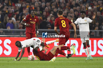 2023-05-11 - Roger Ibanez of A.S. Roma and Moussa Diaby of Bayer 04 Leverkusen during the first leg of the Semi-final of the UEFA Europa League between A.S. Roma vs Bayer 04 Leverkusen on May 11, 2023 at the Stadio Olimpico in Rome. - SEMIFINAL - AS ROMA VS BAYER 04 LEVERKUSEN - UEFA EUROPA LEAGUE - SOCCER