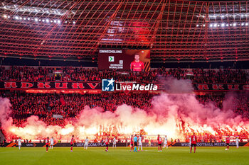 2023-05-18 - Fireworks used by Fans and Supporters of Bayer 04 Leverkusen during the UEFA Europa League, Semi-finals, 2nd leg football match between Bayer 04 Leverkusen and AS Roma on May 18, 2023 at BayArena in Leverkusen, Germany - FOOTBALL - EUROPA LEAGUE - LEVERKUSEN V ROMA - UEFA EUROPA LEAGUE - SOCCER