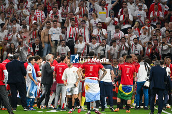 2023-05-31 - Happiness of Sevilla FC and supporters after winning the Europe League final soccer match between AS Roma vs. Sevilla at the Puskas Arena in Budapest, Hungary, 31st of May 2023 - FINAL - SEVILLA FC VS AS ROMA - UEFA EUROPA LEAGUE - SOCCER