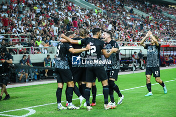 2023-09-21 - SC Freiburg players celebrating a goal during the Europa League Group A match between Olympiacos FC and SC Freiburg at Georgios Karaiskakis Stadium on September 21, 2023, in Athens, Greece. - OLYMPIACOS VS FREIBURG, EUROPA LEAGUE, GROUP A - UEFA EUROPA LEAGUE - SOCCER
