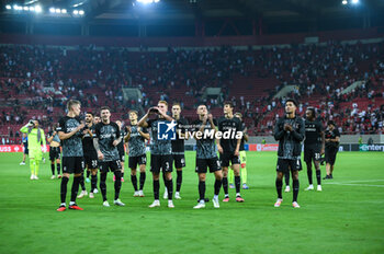 2023-09-21 - SC Freiburg players celebrating the victory during the Europa League Group A match between Olympiacos FC and SC Freiburg at Georgios Karaiskakis Stadium on September 21, 2023, in Athens, Greece. - OLYMPIACOS VS FREIBURG, EUROPA LEAGUE, GROUP A - UEFA EUROPA LEAGUE - SOCCER