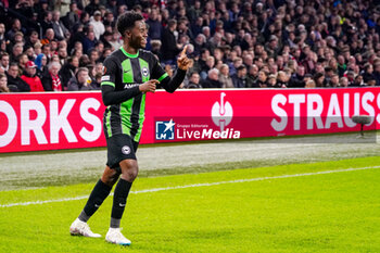 2023-11-09 - Simon Adingra of Brighton & Hove Albion celebrates his goal 0-2 during the UEFA Europa League, Group B football match between AFC Ajax and Brighton & Hove Albion on November 9, 2023 at the Johan Cruyff ArenA in Amsterdam, Netherlands - FOOTBALL - EUROPA LEAGUE - AJAX V BRIGHTON - UEFA EUROPA LEAGUE - SOCCER