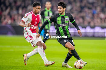 2023-11-09 - Mahmoud Dahoud of Brighton & Hove Albion and Silvano Vos of AFC Ajax during the UEFA Europa League, Group B football match between AFC Ajax and Brighton & Hove Albion on November 9, 2023 at the Johan Cruyff ArenA in Amsterdam, Netherlands - FOOTBALL - EUROPA LEAGUE - AJAX V BRIGHTON - UEFA EUROPA LEAGUE - SOCCER