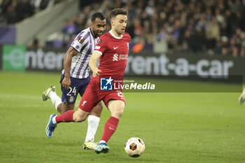 2023-11-09 - Diogo Jota of Liverpool, Cristian Casseres Jr of Toulouse during the UEFA Europa League, Group E football match between Toulouse FC and Liverpool FC on November 9, 2023 at the Stadium in Toulouse, France - FOOTBALL - EUROPA LEAGUE - TOULOUSE V LIVERPOOL - UEFA EUROPA LEAGUE - SOCCER