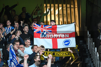 2023-11-30 - English supporters are having fun during the UEFA Europa League, Group B match between AEK FC and Brighton & Hove Albion at Opap Arena on November 30, 2023, in Athens, Greece. - AEK FC VS BRIGHTON - UEFA EUROPA LEAGUE, GROUP B - UEFA EUROPA LEAGUE - SOCCER